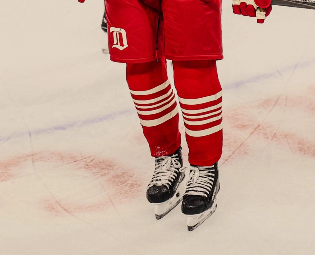 Why Do Hockey Players Tape Their Socks